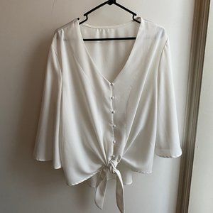 White Blouse. Ties in front. Brand unknown. Size M